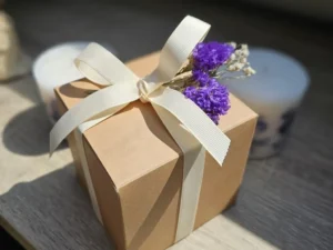 Handmade gift box tied with ivory ribbon and dried lavender